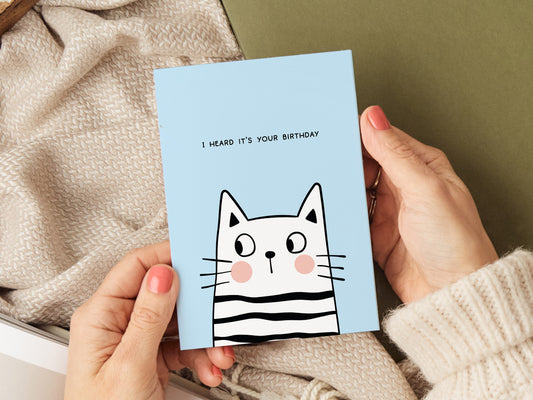 Birthday card which reads 'I heard it was your birthday' with a illustration of a cat.