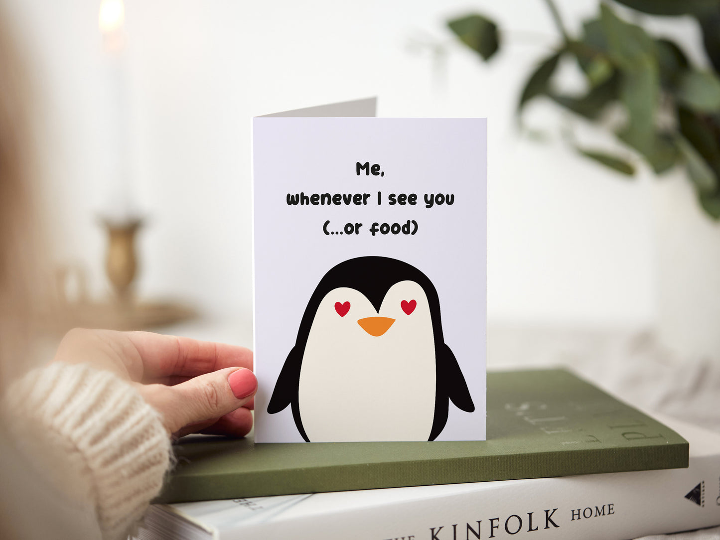 Anniversary card which reads 'me whenever I see you (or food)'. It has an illustration of a penguin with hearts as eyes.