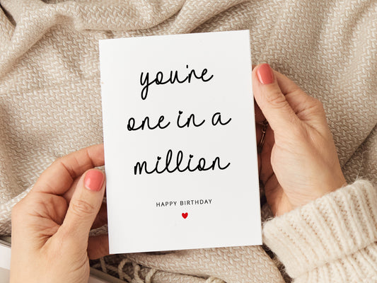 A heartfelt birthday card with the message "You're one in a million. Happy birthday." Featuring a simple yet meaningful design, this card is perfect for celebrating someone special. Printed on high-quality card stock and includes a white envelope.