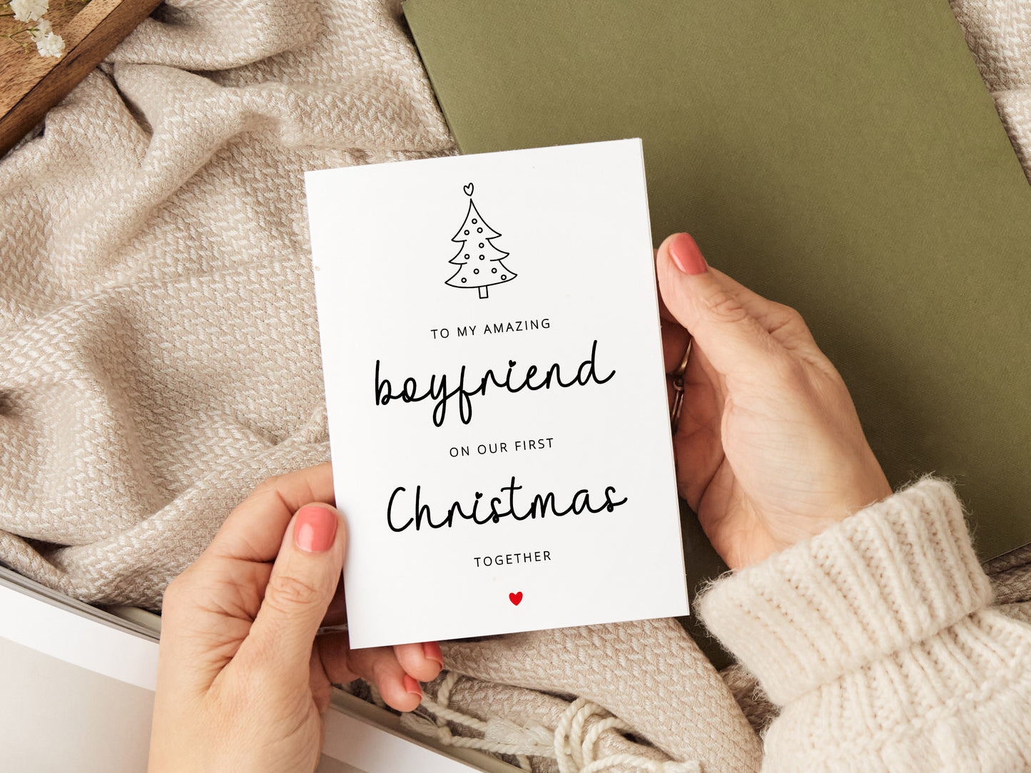 Boyfriend Christmas card which reads 'to my amazing boyfriend on our first Christmas together' with a drawing of a Christmas tree.