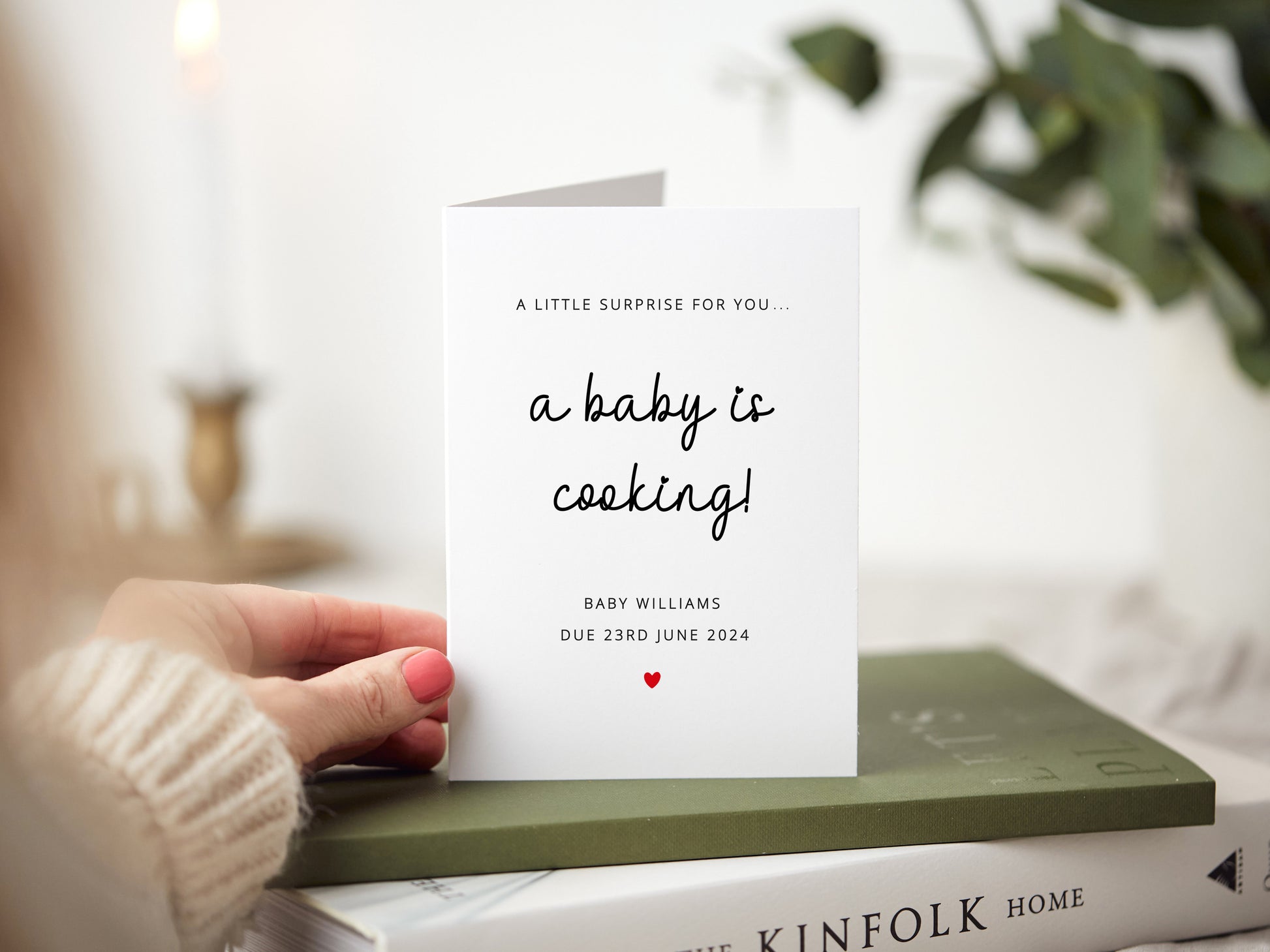 Pregnancy announcement card with reads 'a little surprise for you. A baby is cooking! Baby (name) due (due date).