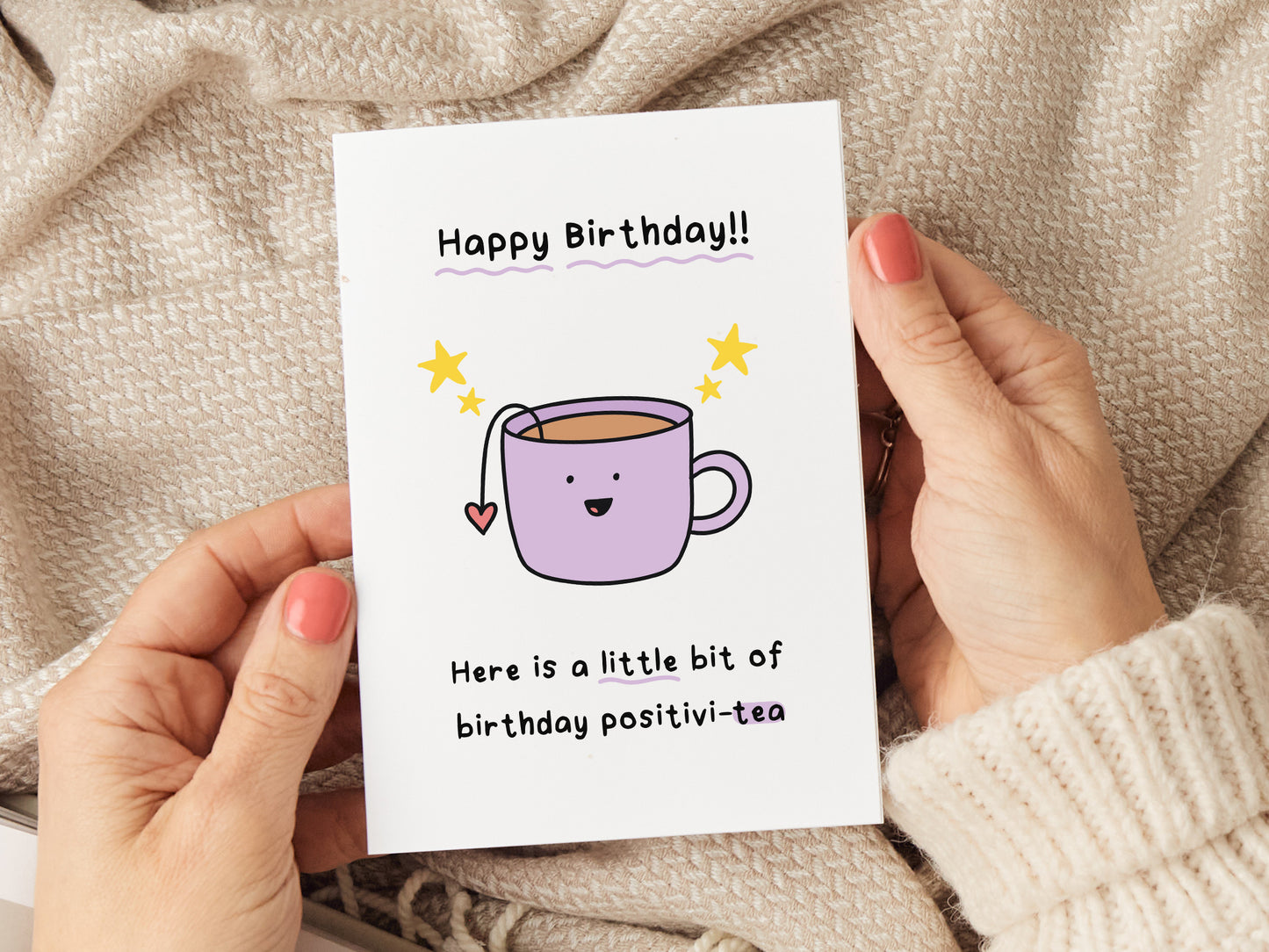 A charming birthday card featuring the message "Happy Birthday. Here is a little bit of birthday positivi-tea" alongside an illustration of a cup of tea. Perfect for tea lovers and those who appreciate a thoughtful, uplifting greeting. Printed on high-quality card stock and includes a white envelope.