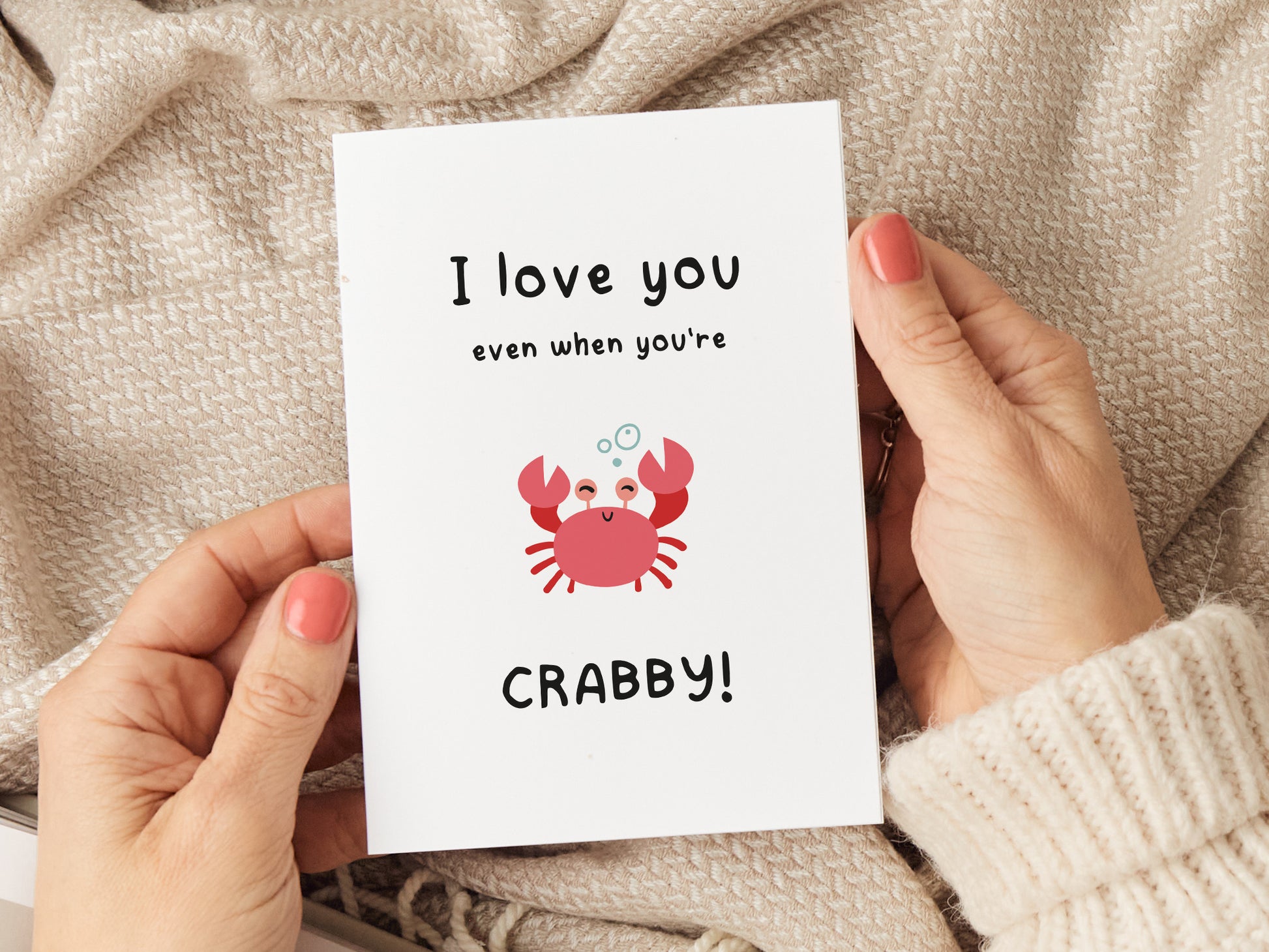 Greeting card which reads 'I love you even when you're crabby' with an illustration of a crab.