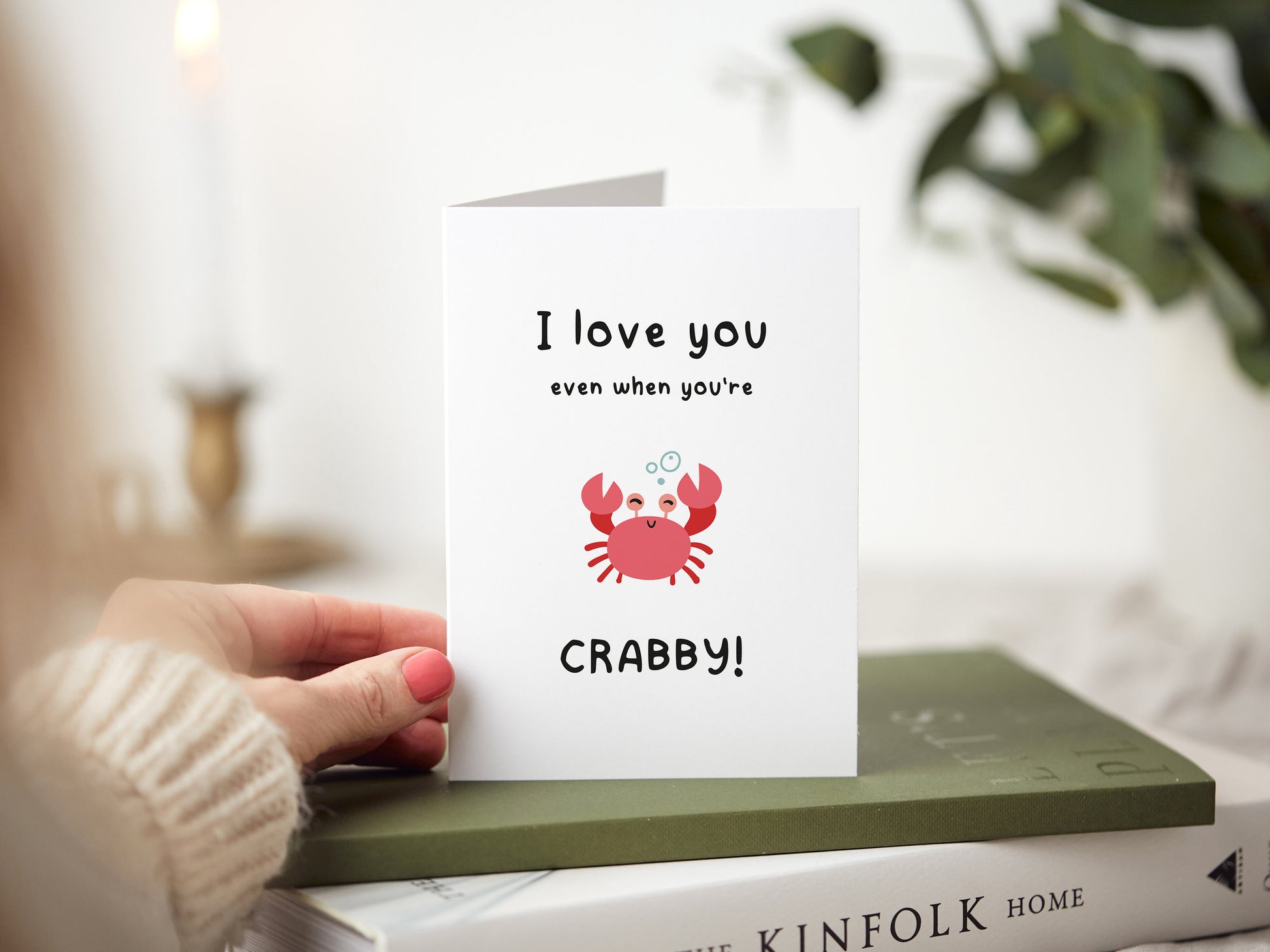 Greeting card which reads 'I love you even when you're crabby' with an illustration of a crab.