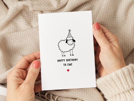 Birthday card which reads 'happy birthday to ewe' with an illustration of a sheep.