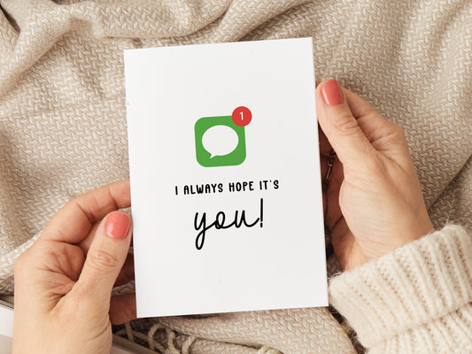 Anniversary card which reads 'I always hope it's you' with the iMessage icon.
