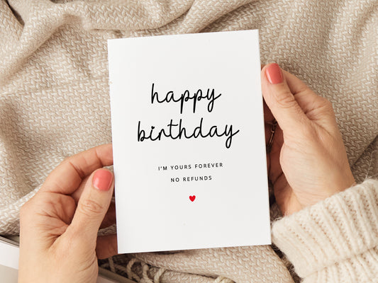 Birthday card which reads 'happy birthday I'm yours forever no refunds'.