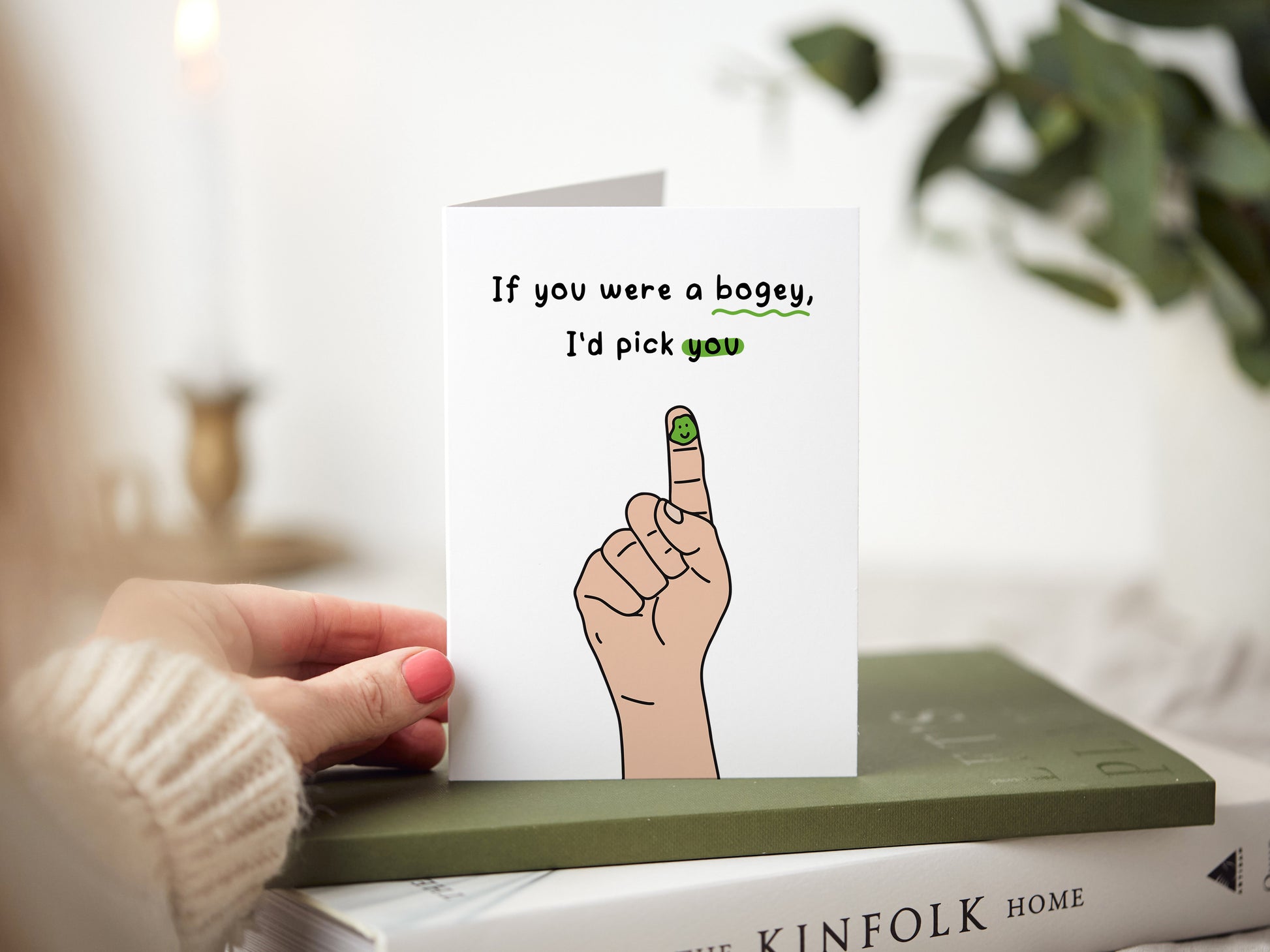 Greeting card which reads 'if you were a bogey, I'd pick you'.