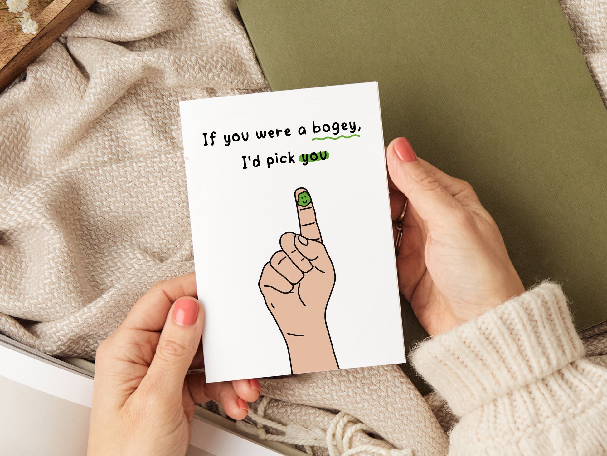 Greeting card which reads 'if you were a bogey, I'd pick you'.