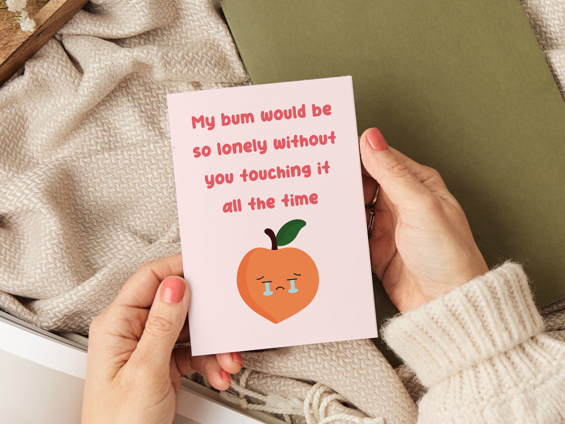 Anniversary card which reads 'my bum would be so lonely without you touching it all the time' and has a cartoon peach crying.