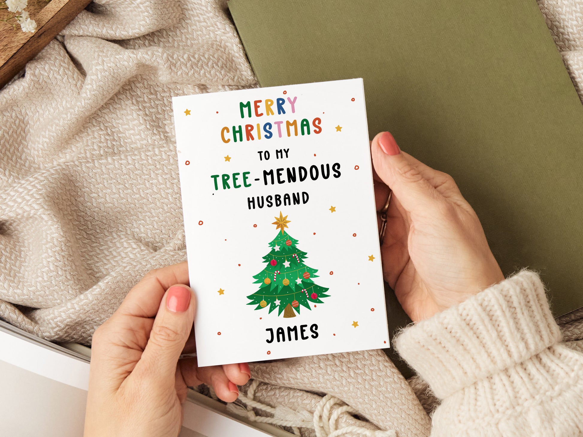 Personalised husband Christmas card which reads 'merry christmas to my tree-mendous husband (name)' and has an illustration of a Christmas tree.