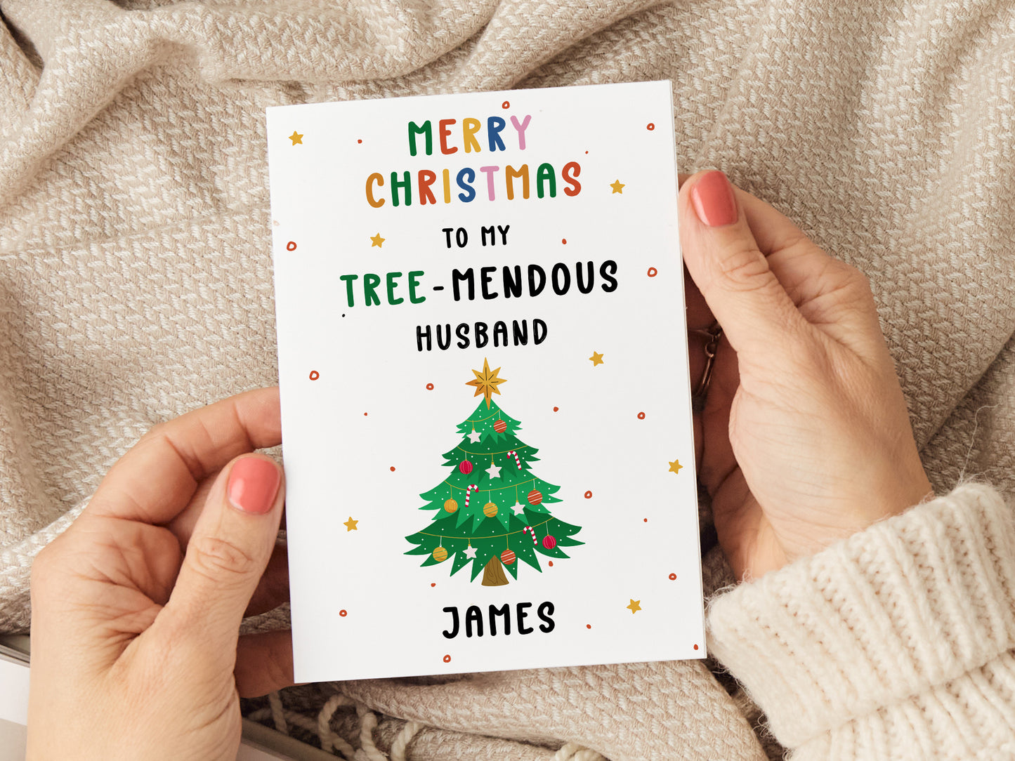 Personalised husband Christmas card which reads 'merry christmas to my tree-mendous husband (name)' and has an illustration of a Christmas tree.